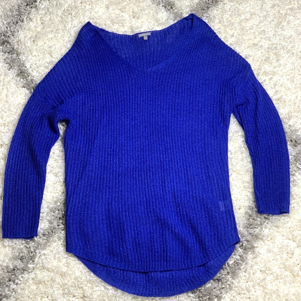 Royal blue sweater. Size medium. Worn once. Good condition.